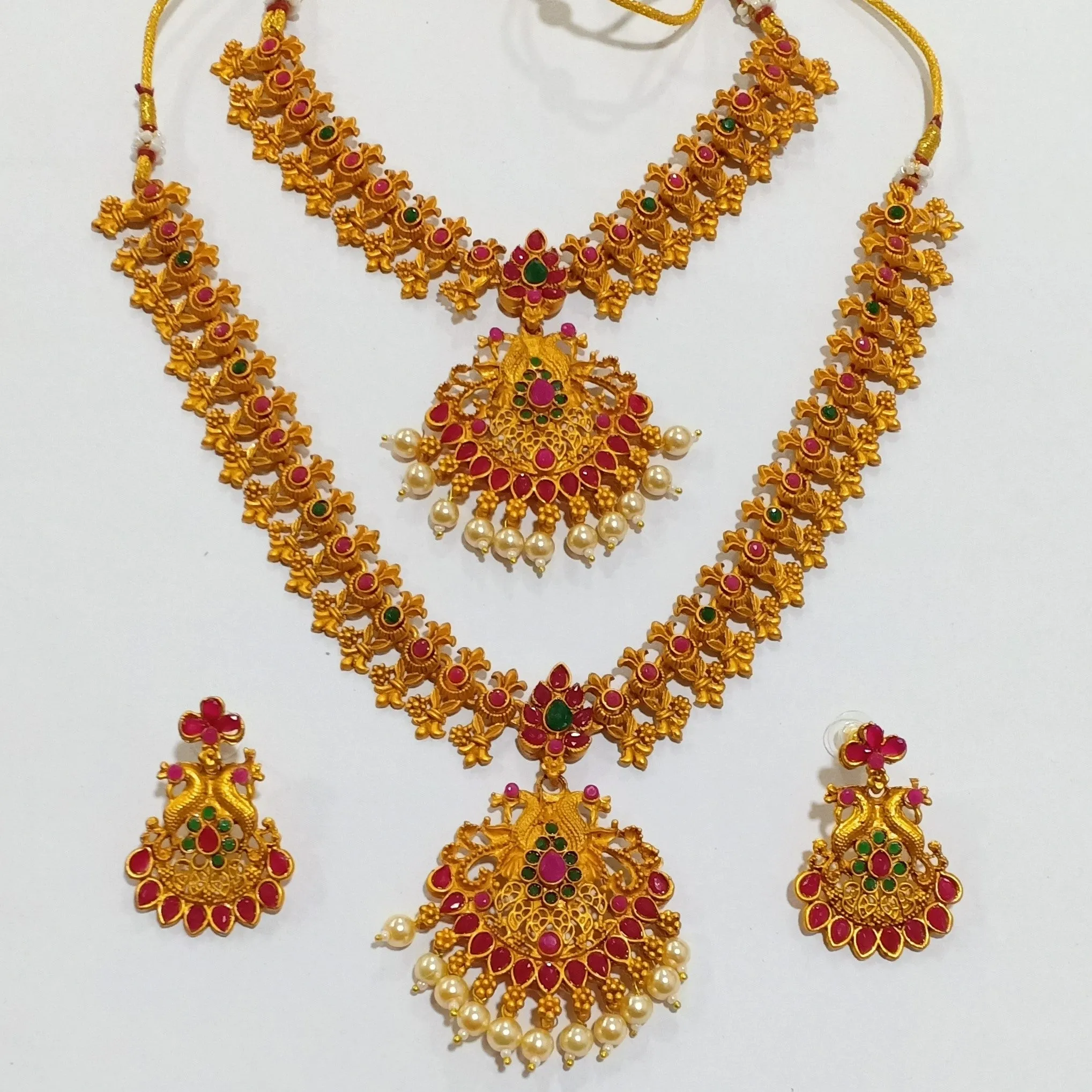 Estele Gold Plated Double line Peacock Nakshi Temple Necklace Set with Colored Stones & Pearls for Women